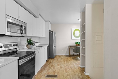 Kitchen with white cabinetry