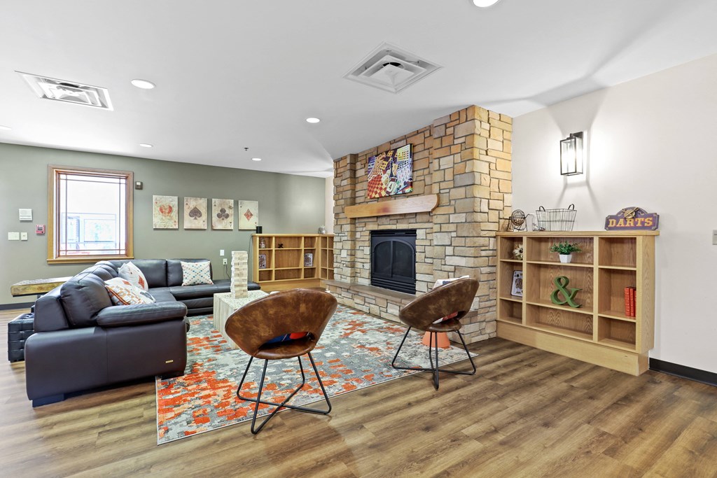 a living room with a fireplace and a couch