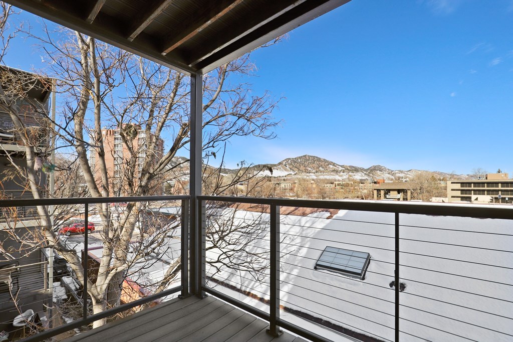 the view of the mountains from the balcony