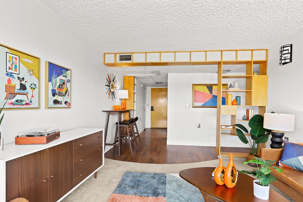 a living room with a dining room and a kitchen