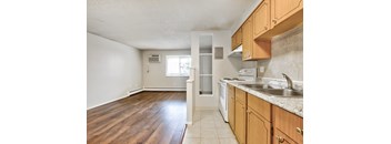 white appliances in kitchen at Kingsbrook Arms, Englewood, Co