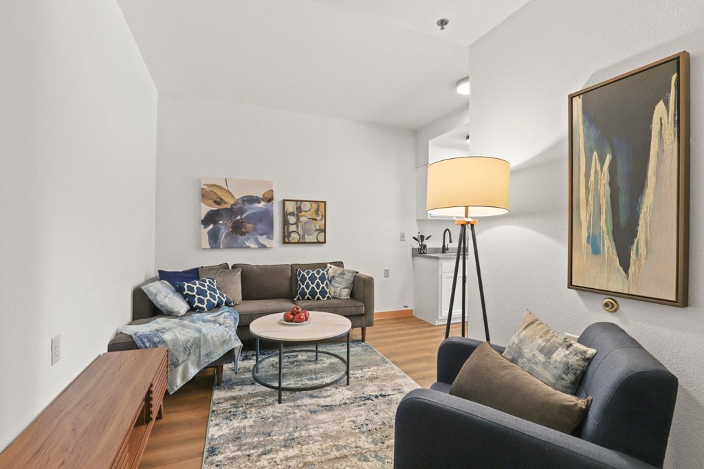 a living room with couches and a coffee table