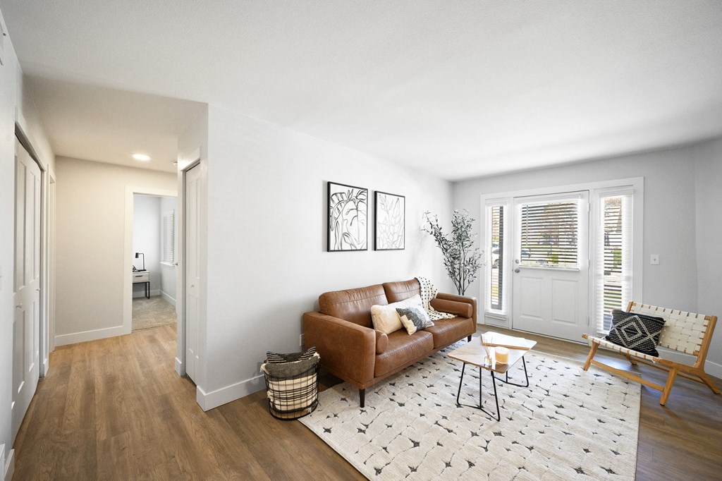 a living room with a couch and a table