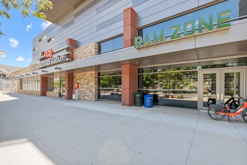 A Ram Zone storefront with a bicycle parked outside.