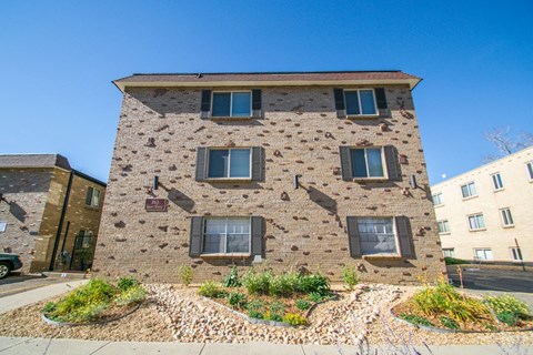an image of a brick building with windows