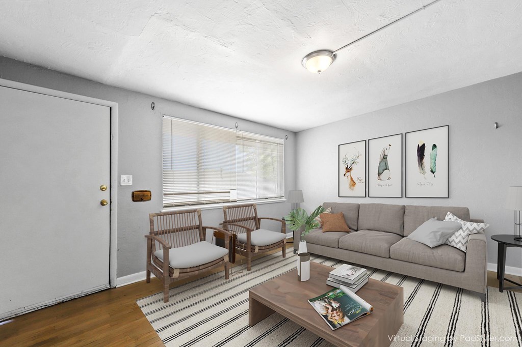 a living room with a couch and a coffee table