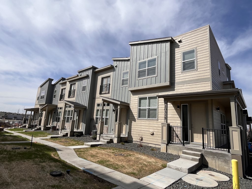Apartment Exterior with balconies at The Townhomes at Pine Drive, Colorado