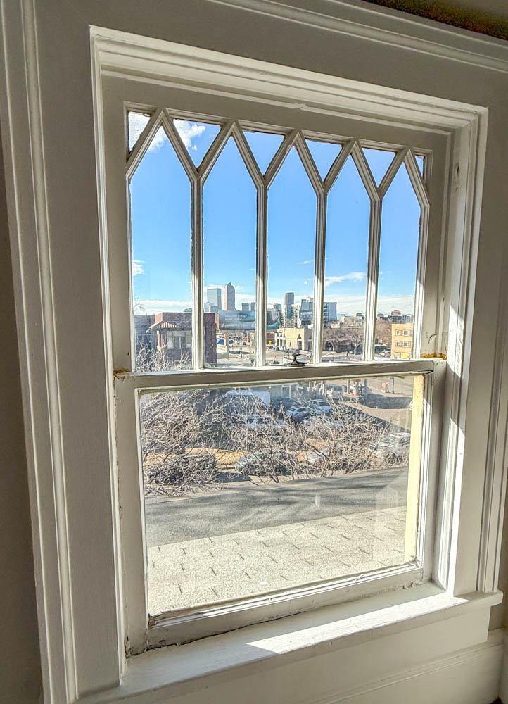 Closet window with view of the mountains and downtown