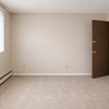 A room with a door and a window.