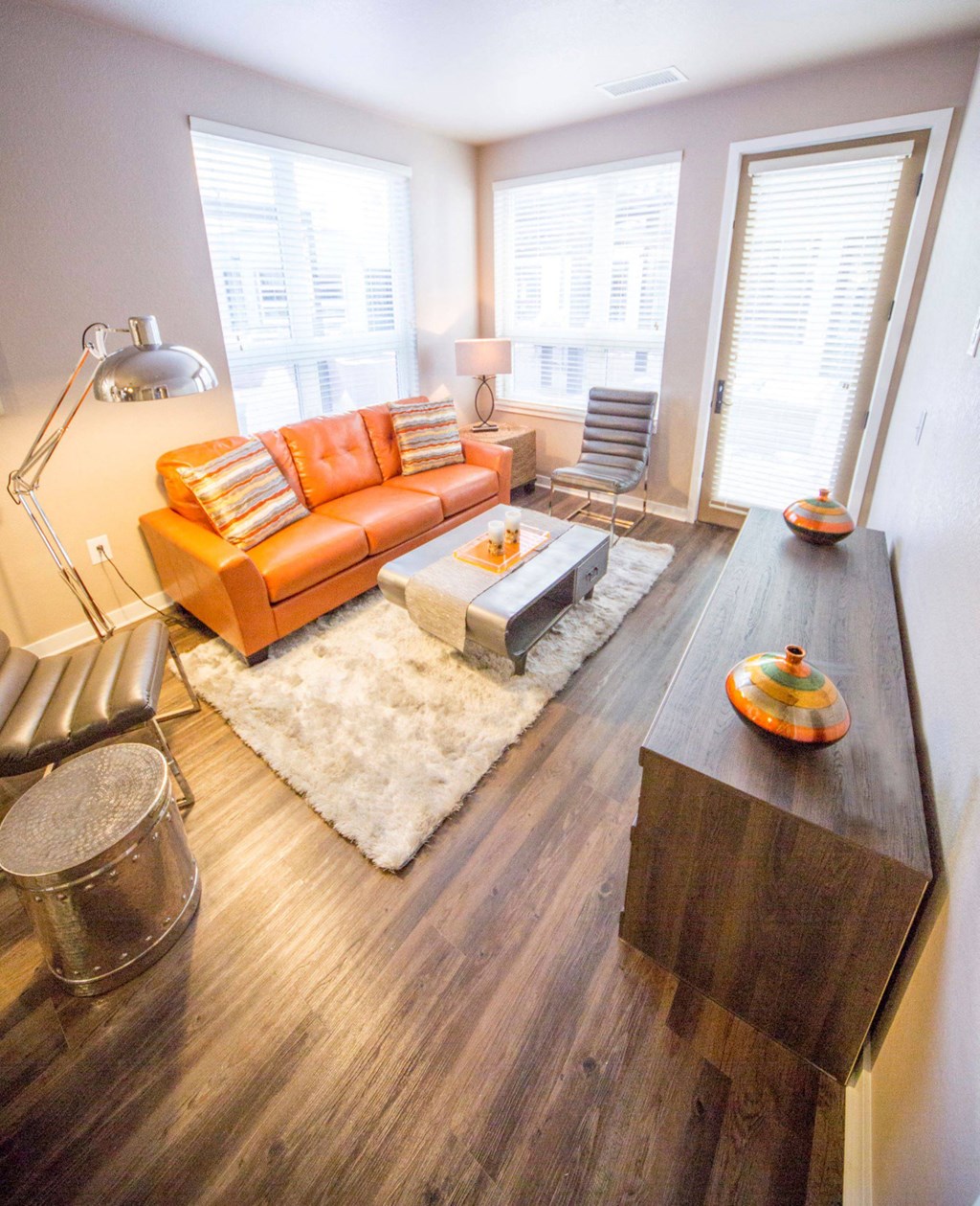 a living room with a couch and a table