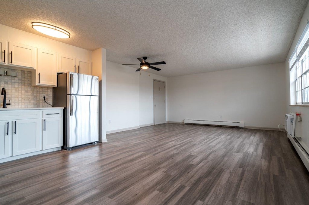 Living room with wooden floorat Postmark at Littleton, Littleton, Colorado