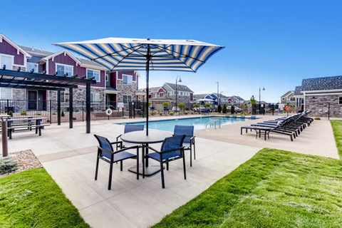 Sparkling Swimming Pool with seating area at The Point at Biscay, Aurora, CO, 80013