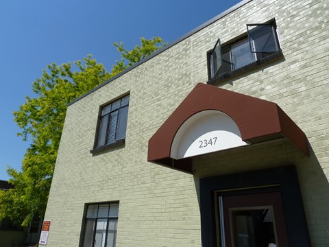 A building with the number 2347 on the awning.