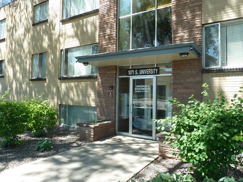 The front of a building with the words 181 S. University on it.