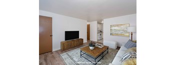 a living room with a couch and a coffee table