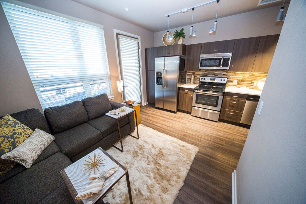 a living room with a couch and a table