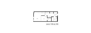 A floor plan of a small apartment with a living room, bedroom, kitchen, and bathroom.