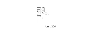 A floor plan of a living space with a kitchen, bathroom, and bedroom.