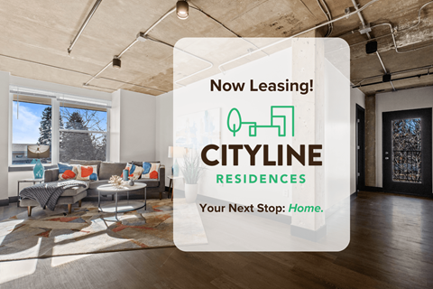 A modern living room with a glass window overlooking a tree and a sign that says "Now Leasing! Cityline Residences Your Next Stop: Home.".