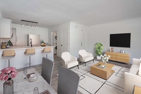 a living room and dining room with a table and chairs