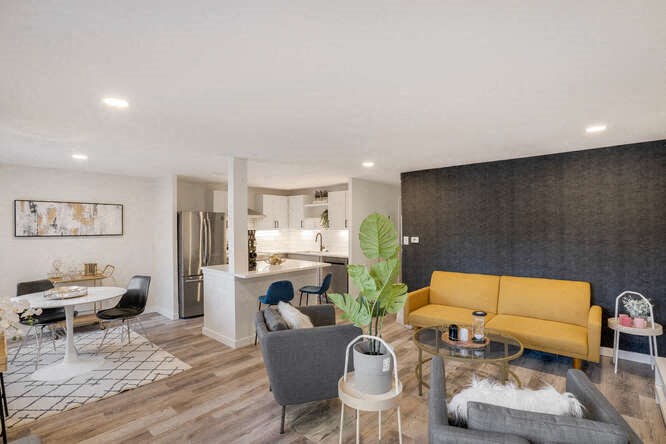 an image of a band playing in a room with geometric patterns at The Iris Apartments, Arvada