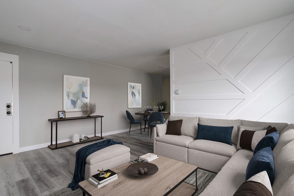 a living room with a couch and a coffee table