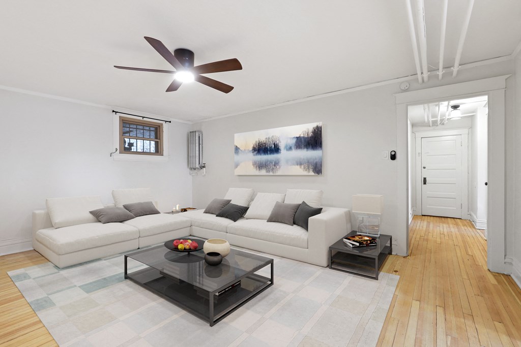 a living room with two couches and a coffee table