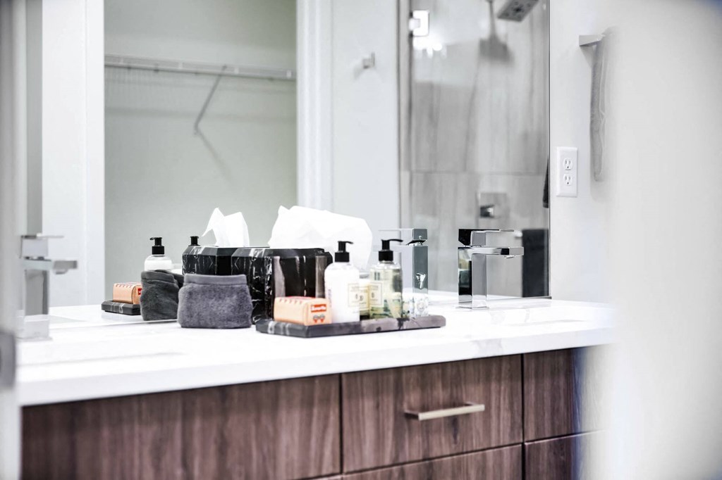 a bathroom with a sink and a mirror