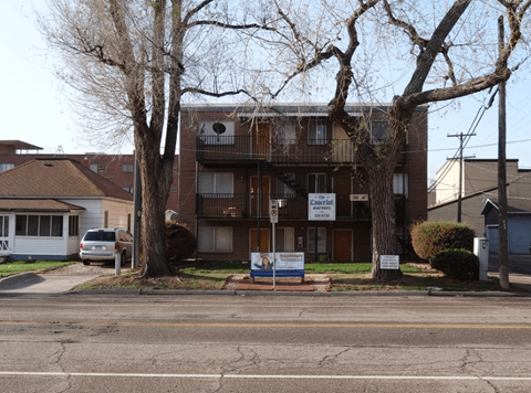 Apartment building with a sign that says "Cancellation" on it.