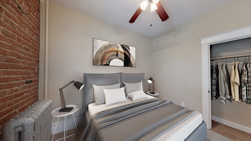 a bedroom with a bed and a closet