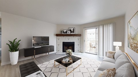 A living room with a fireplace and a television.
