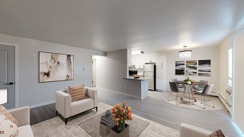 A living room with a grey couch and a coffee table.