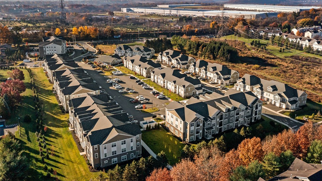 an aerial view of a group of houses in a neighborhood