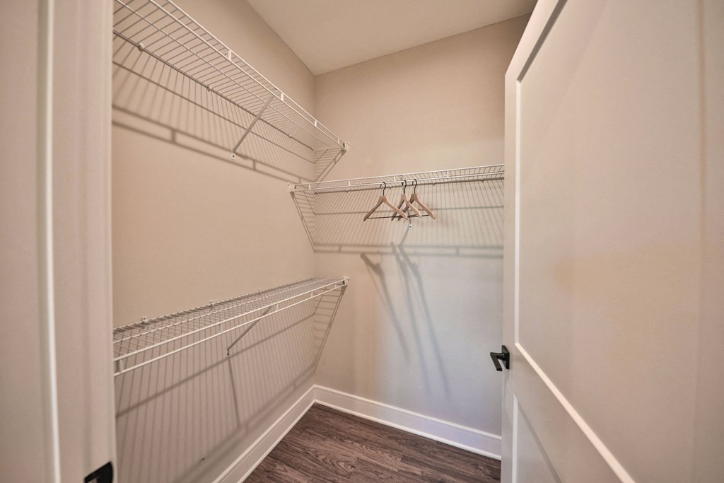 the walk in closet at the preserve at great pond apartments in windsor tx