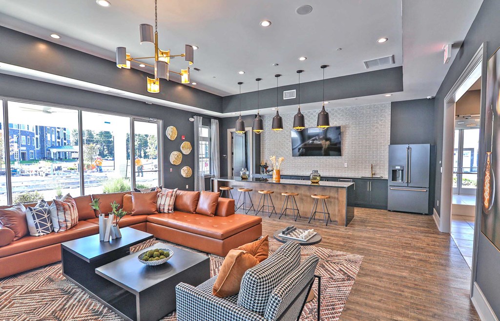 a large living room with couches and a table