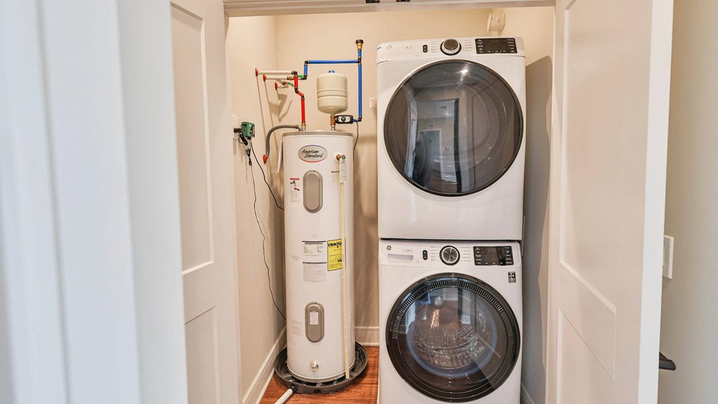 a washer and dryer in a small laundry room