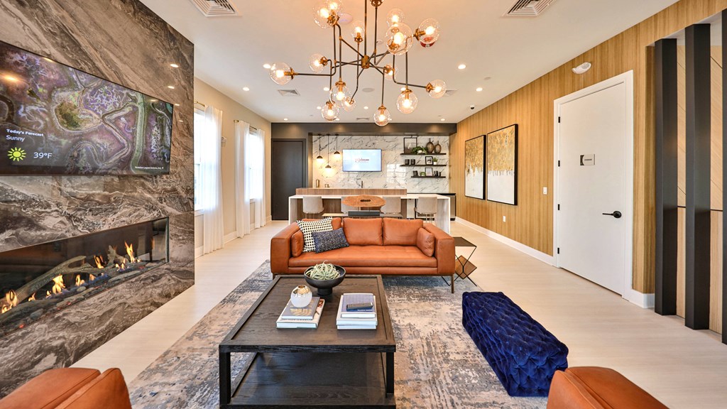 a living room with a fireplace and a couch