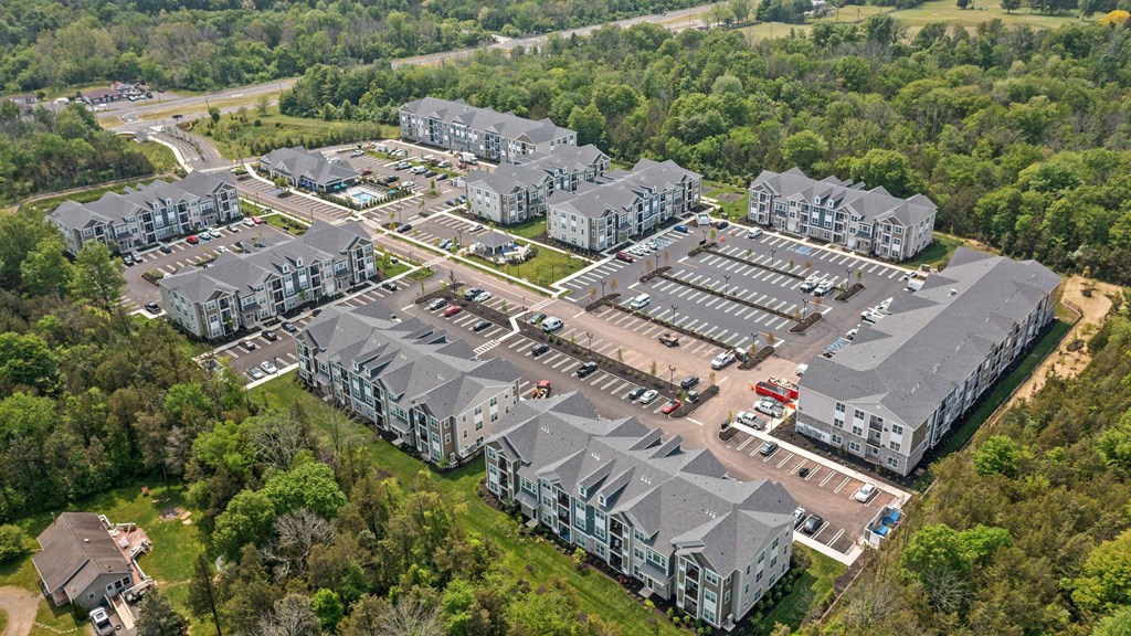 an aerial view of a group of apartment buildings
