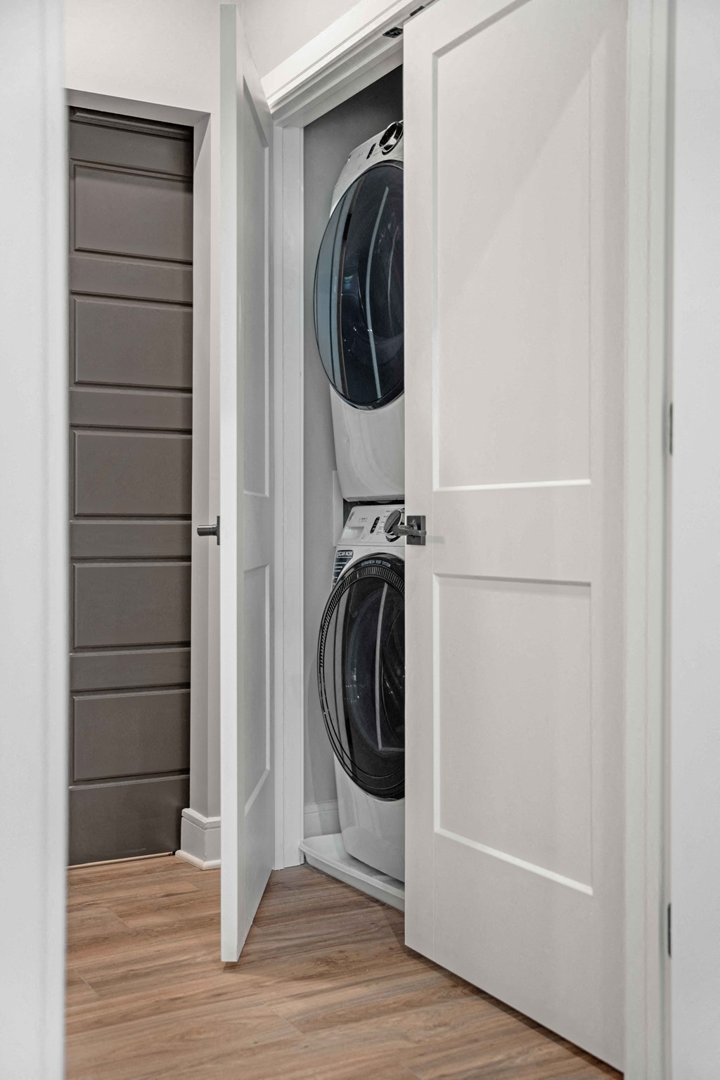 a small laundry room with a washer and dryer in a closet