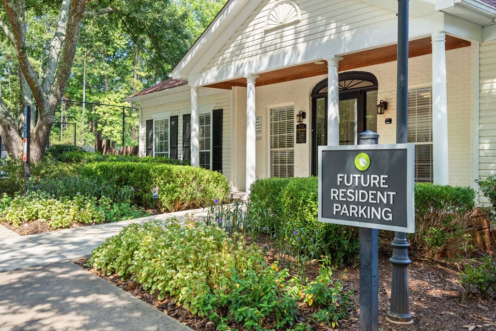 a future resident parking sign in front of a house