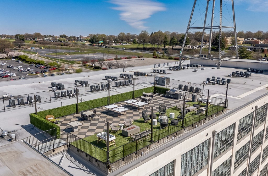 a park on the roof of a building with grass