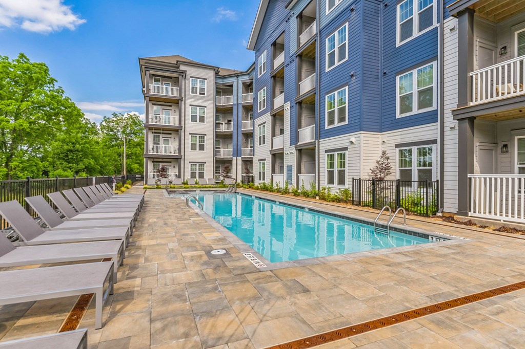 our apartments offer a swimming pool with seating around it