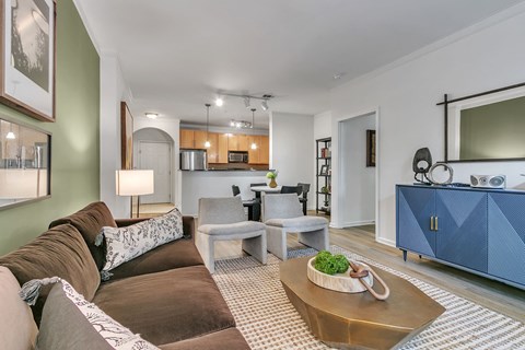 a living room with a couch and a table
