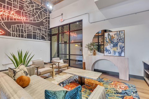 a living room with a couch and a fireplace