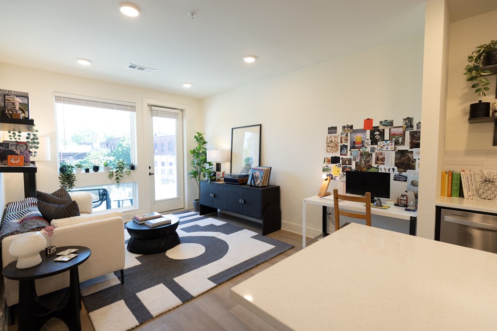 a living room with a couch and a table