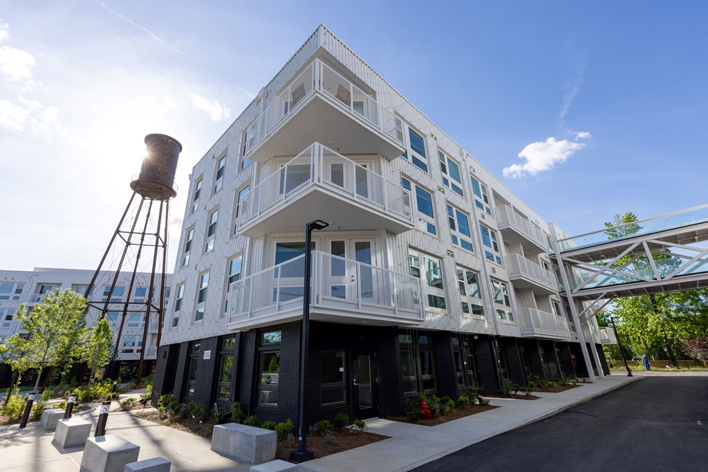 a building with a water tower in front of it