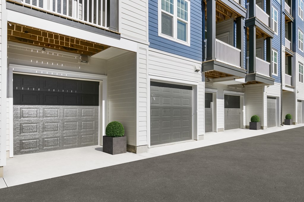 a building with two garage doors in front of it