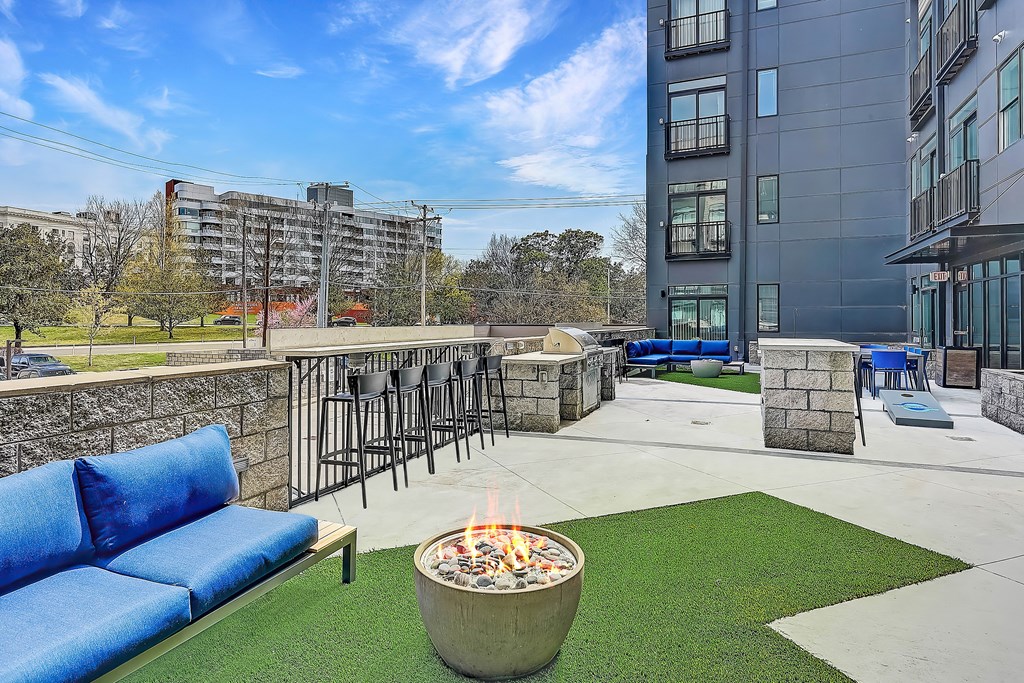 our apartments have an outdoor lounge with a fire pit