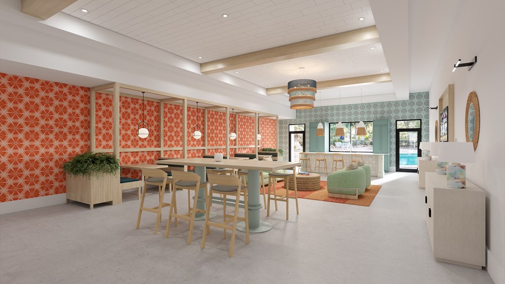 the lobby of a restaurant with tables and chairs and orange wallpaper