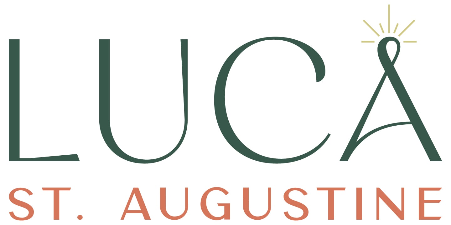 A logo with the word "LUCA" and "ST. AUGUSTINE" below it.